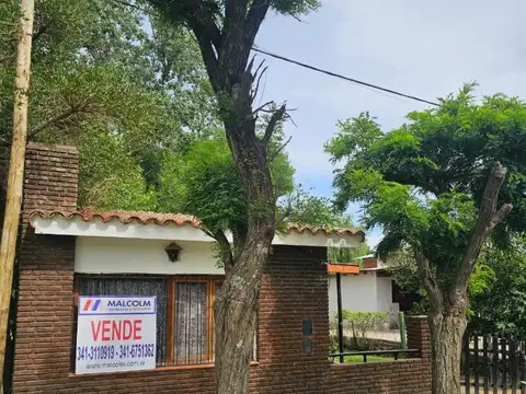 CASA UN DORMITORIO  CON TERRENO