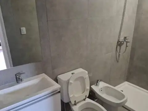 SARMIENTO  1547  - 1 DORMITORIO CONTRAFRENTE + PATIO  - A  ESTRENAR  -