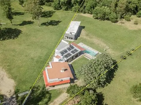 Chacra de ensueño con costas al Río San José