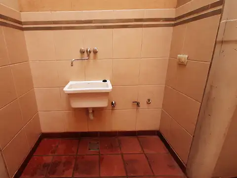 Dos ambientes con patio