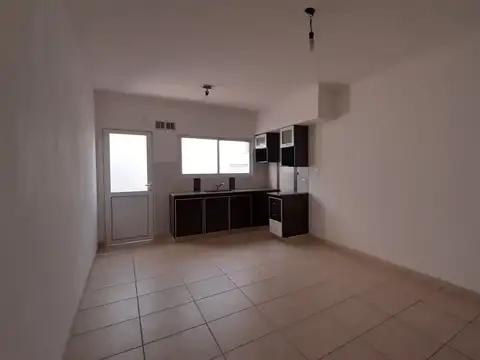 Dos ambientes con patio