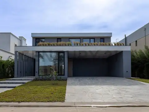 VENTA IMPONENTE CASA 5 DORMITORIOS AL LAGO EN LAGUNA GRANDE,VILLANUEVA,DIQUE LUJ