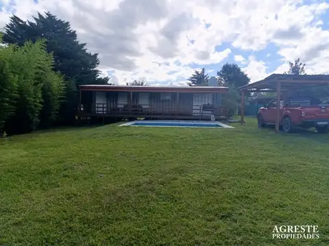 RETASADA   CASA CONTENEDOR CON VISTAS A LAS SIERRAS