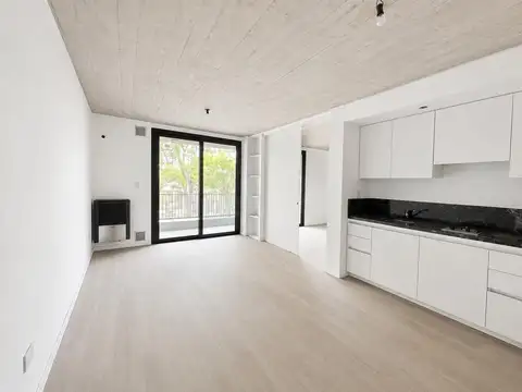 Departamento en  venta 1 dormitorio a estrenar con patio y cochera en Funes - Centro
