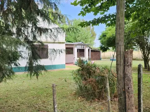 Campo sobre ruta 41, con chalet de dos dormitorios