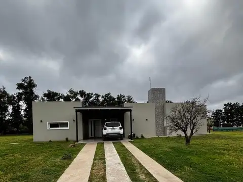 Casa con jardin
