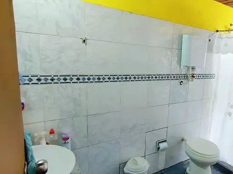 CASA CON LOCAL EN VENTA CENTRO DE FRAY BENTOS