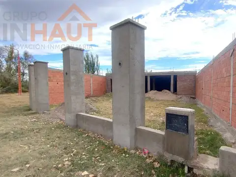 Terreno con mejoras