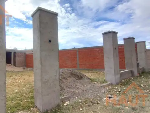 Terreno con mejoras
