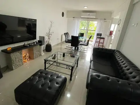 Venta Departamento 4 ambientes con Patio y Cochera