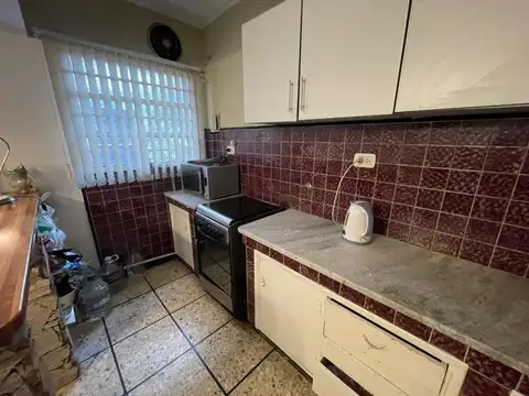 Propiedad con 2 Departamento en block