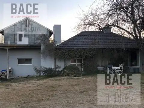 Casa 7 ambientes con 2 baños