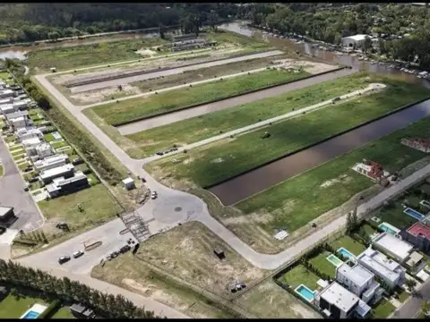 VENTA LOTE AL RIO BARRIO NAUTICO VILLA NUEVA PERMUTA FINANCIA