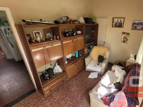 CASA TIPO PH DE 3 AMBIENTES EN PLANTA BAJA, CON PATIO Y JARDIN COMPARTIDO