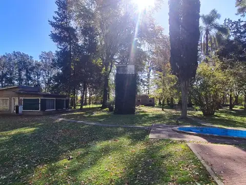 VENTA CHACRA EN PILAR. CON CASAS, GALPONES, PILETA