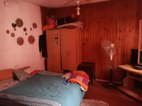 Vivienda multifamiliar con Local a la calle