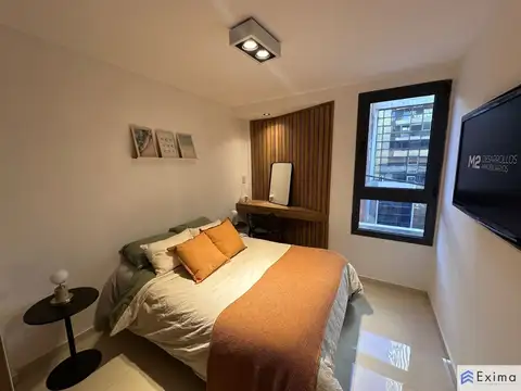 Departamento de 2 dormitorios con patio exclusivo, pileta y parrillero en construcción.