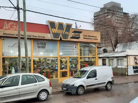 Vendo Terreno 1700 m2 con Local, galpon y ofi frente Ruta 22