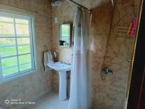 Casa 2 ambientes con 2 baños