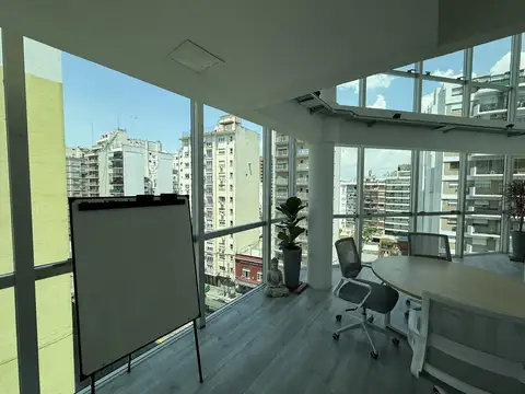 Oficina con cochera en edificio corporativo