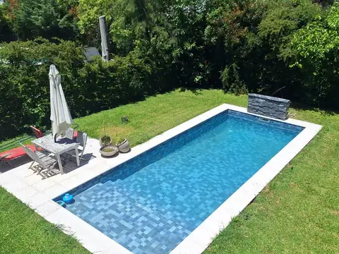 Casa práctica, abierta y luminosa