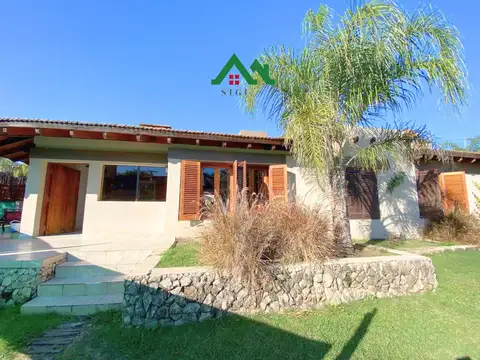 Oportunidad de inversión: dos propiedades en una en Villa Belgrano con pileta y gran terreno