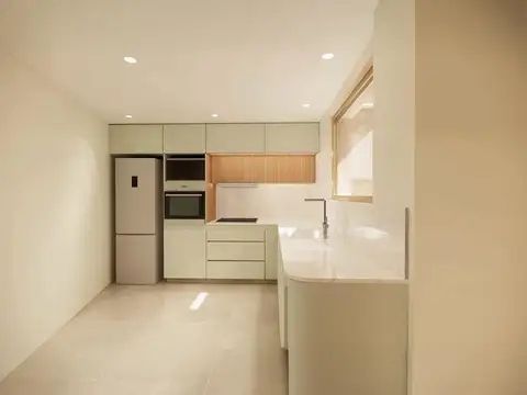 Casa de pasillo único de 3 dormitorios con patio y parrillero