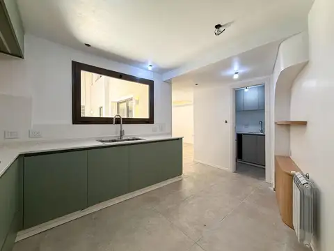 Casa de pasillo único de 3 dormitorios con patio y parrillero