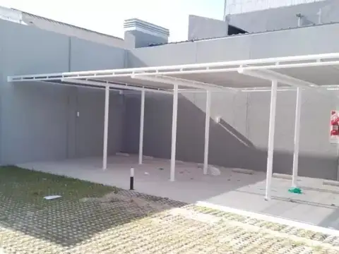 COCHERA SEMI CUBIERTA VILLA RAFFO SPAZIO GOLF