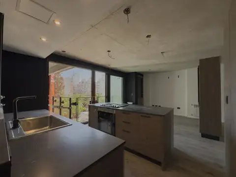 DEPARTAMENTO EN VENTA DE 2 DORMITORIOS C/ PARRILLERO  Y COCHERA EN BARRIO MARTIN