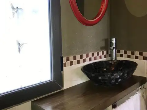 Casa 2 ambientes con 2 baños