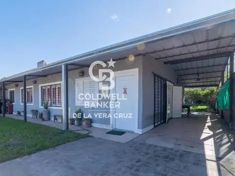 Casa de dos dormitorios con piscina sobre Ruta 1 - Km 12