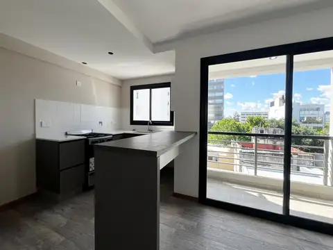 DEPARTAMENTO DE DOS DORMITORIOS CON COCHERA EN VENTA