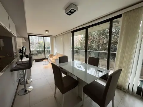 Departamento de dos dormitorios con cochera en alquiler en Condominios del alto III