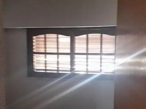 chalet fondo , garage y parrilla