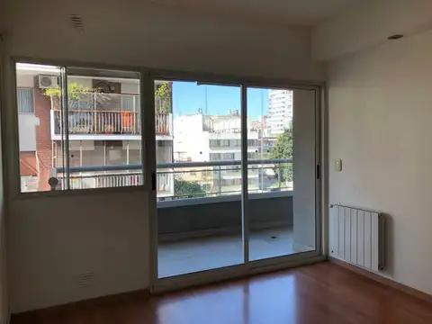EXCELENTE 2 AMBIENTES CON COCHERA FIJA CUBIERTA