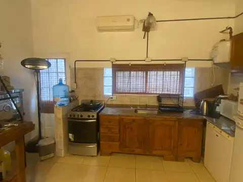 Venta Casa Andino dos dormitorios, amplio terreno, pileta
