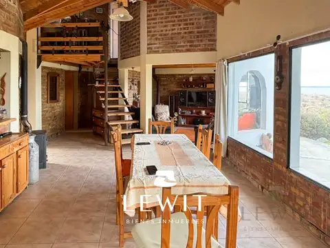 VENTA CASA 2 DORMITORIOS CON GARAGE  Y QUINCHO EN EL LAGO MARI MENUCO Bº CLUB HIDRONOR