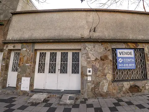 CASA CON DEPARTAMENTO DE PASILLO