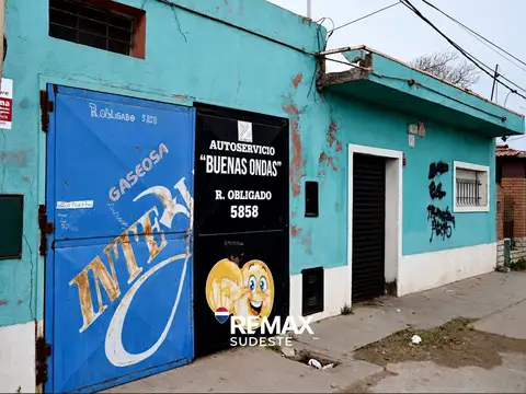 CASA CON LOCAL A REFACCIONAR - BARRIO GRUMBEIN