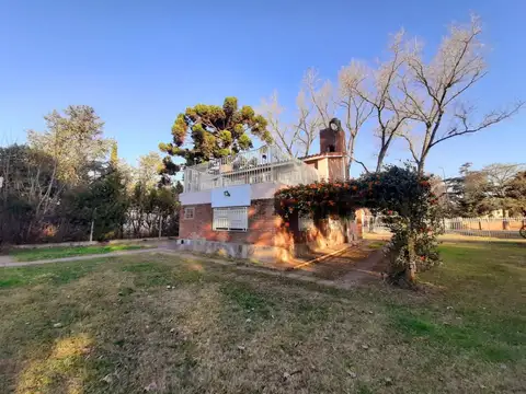 TERRENOS PARQUIZADOS CON CHALET Y PILETA SOBRE RUTA 9 FUNES