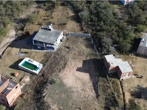 ?Lote 1070m2 Escritura Carlos Paz 5 cuadras de rio