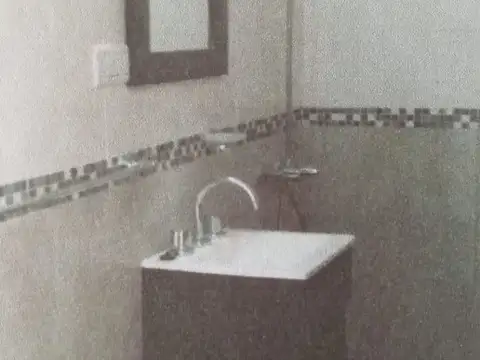 10 deptos + Local  a una cuadra de la estación