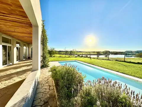 VENTA CASA 6 AMBIENTES A ESTRENAR - VISTA A LAGUNA EN EL CANTON GOLF