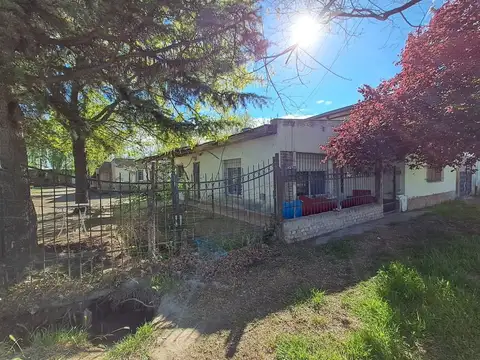 VENTA TERRENO CON CASA Y DEPARTAMENTOS