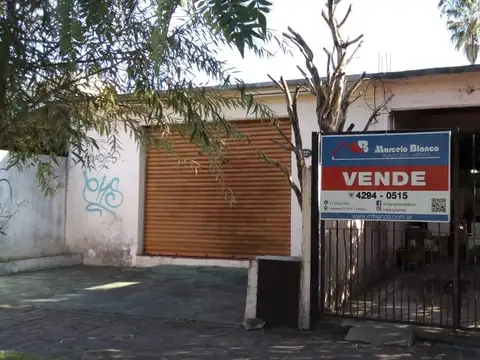 LOTE CON MEJORAS EN EXCELENTE UBICACION  