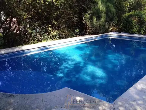 Casa en venta con piscina en Country Club Los Cardales