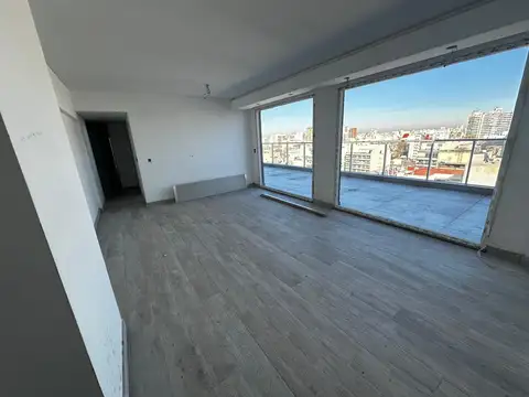 HERMOSO SEMIPISO A ESTRENAR - 3 AMBIENTES CON GRAN BALCÓN TERRAZA CON PARRILLA Y COCHERA FIJA