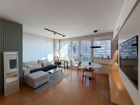 Departamento de 1 dormitorio amoblado con vista al río y cochera opcional