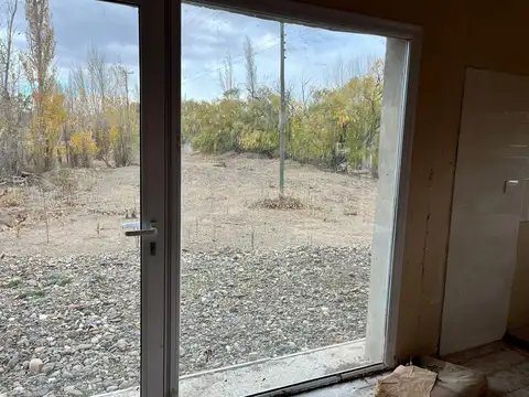 Terreno con avance de obra en Plottier